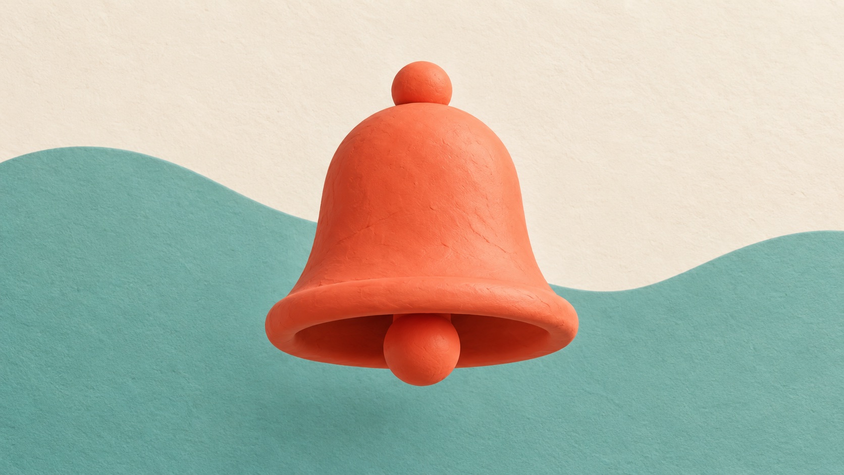 A small simple bell-shaped symbol stands among blank cards.
