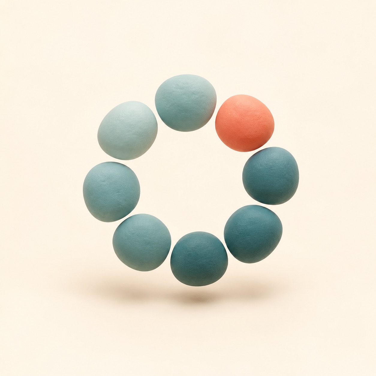 A simple circular shape is arranged to suggest motion.